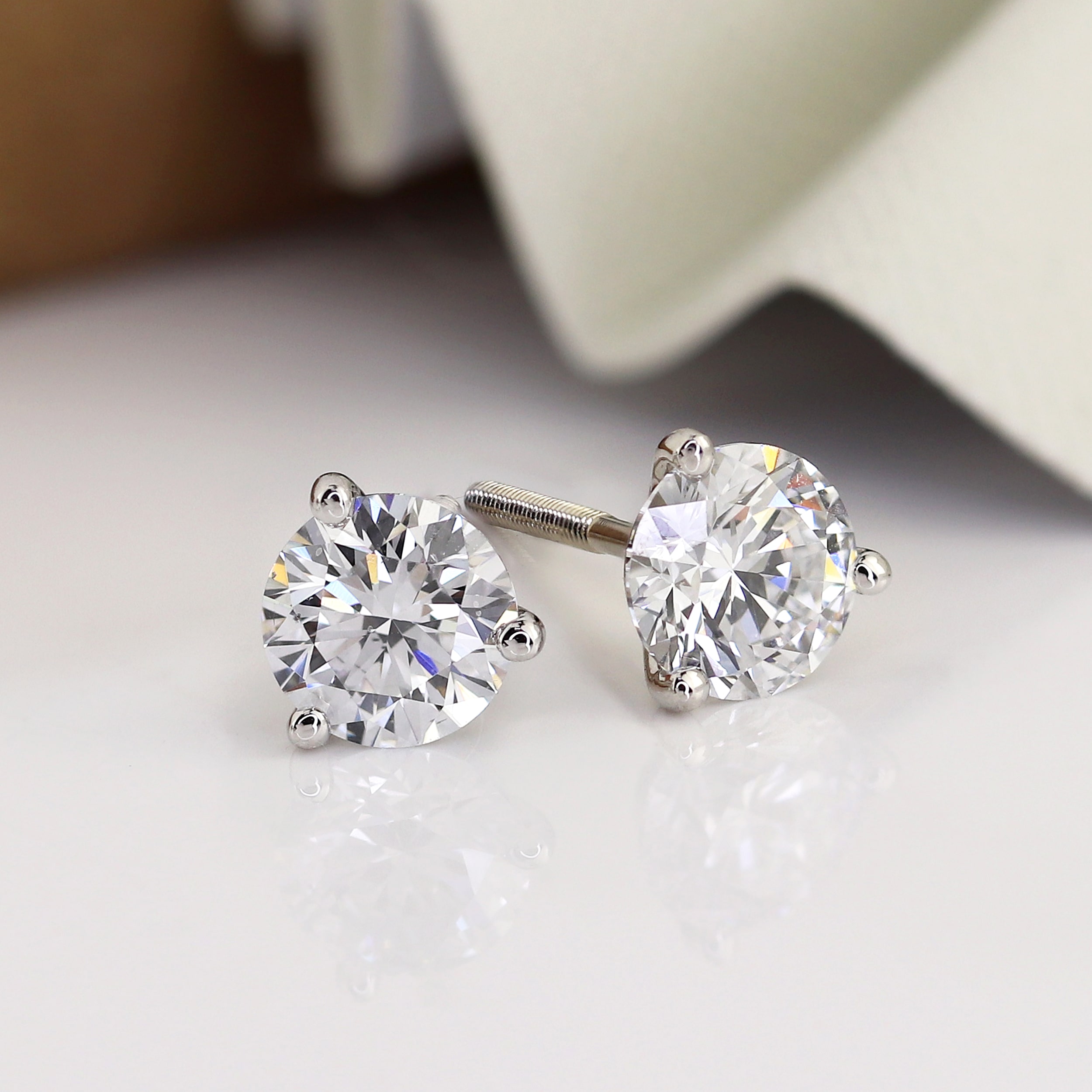 https://www.diamondstuds.com/images/prong-martini-stud-solitaire-earrings.jpg